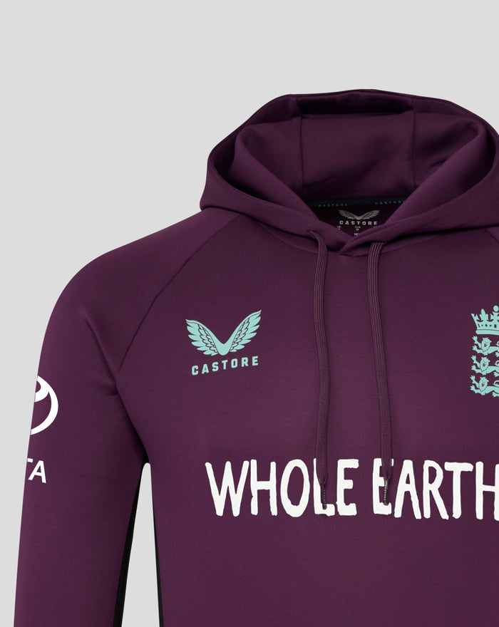 Lower front view of maroon hoodie showing Whole Earth slogan and blue crest on chest