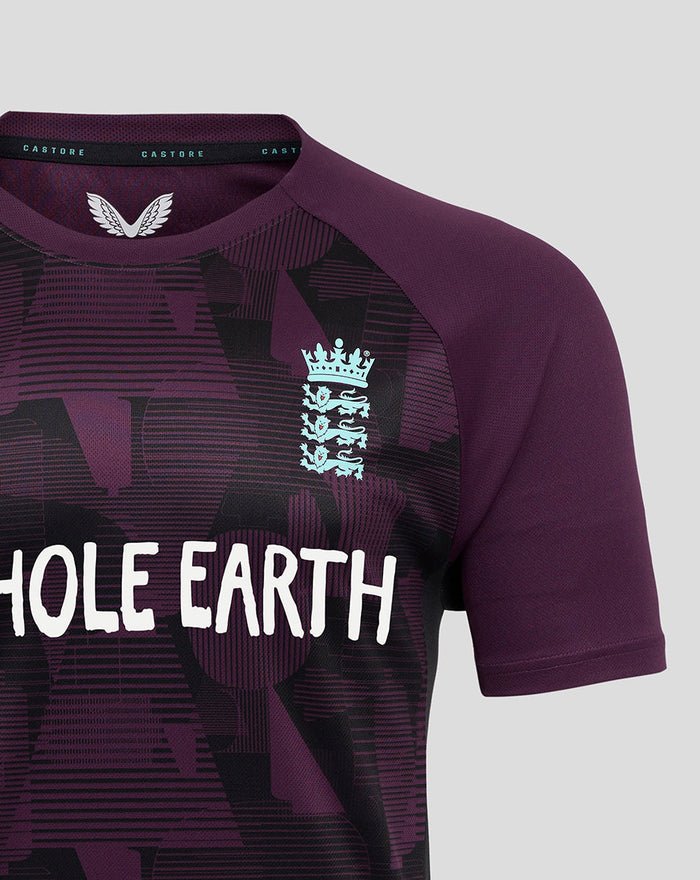 Front close up of purple England cricket pro training short sleeve T shirt showing bold Whole Earth graphic and light blue England crest on the left chest.