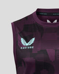 Close-up of ECB Men 25/26 Training Vest showing purple black geometric pattern and Castore wing logo