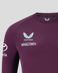 Close-up of upper chest on maroon England Cricket Pro Training Sweatshirt with light blue wing logo and Whole Earth text