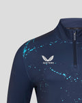 Close-up of chest on navy Yorkshire Graphic Performance 1/4 Zip Top showing turquoise splatter print and Castore logo