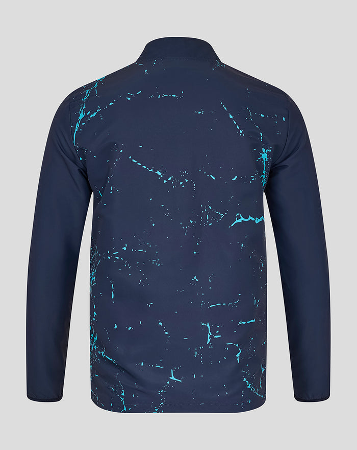 Back view of navy Yorkshire Graphic Track Jacket with turquoise splatter pattern across the upper back.