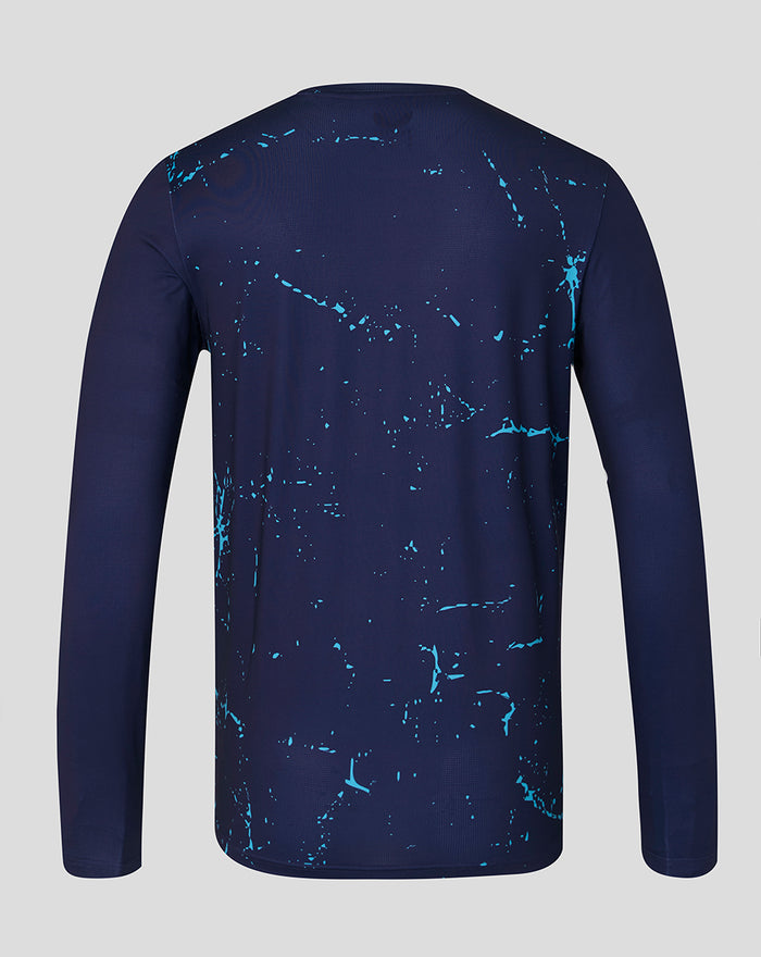 Back view of navy long sleeve performance tee with cyan splatter across the back.