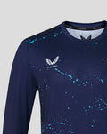 Navy long sleeve performance tee with blue splatter pattern and winged crest on the chest