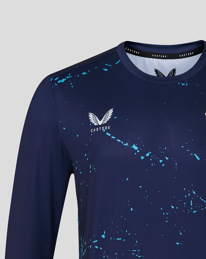 Navy long sleeve performance tee with blue splatter pattern and winged crest on the chest