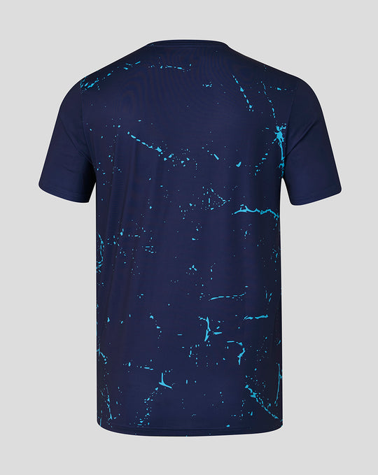 Back view of navy Peacoat short sleeve performance T shirt with light blue splatter pattern.