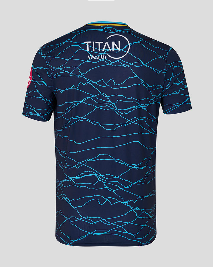 Back view of navy peacoat T20 short sleeve jersey with teal wave pattern and TITAN Wealth logo on upper back.