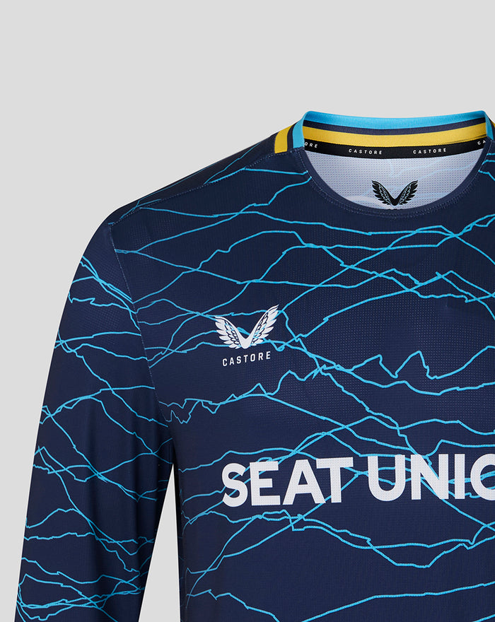 Close-up of navy T20 jersey showing SEAT UNIQUE across chest, white wing crest and blue crack pattern
