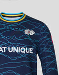 Detail of navy sweatshirt showing Castore wing logo and SEAT UNIQUE text on the blue crackle pattern