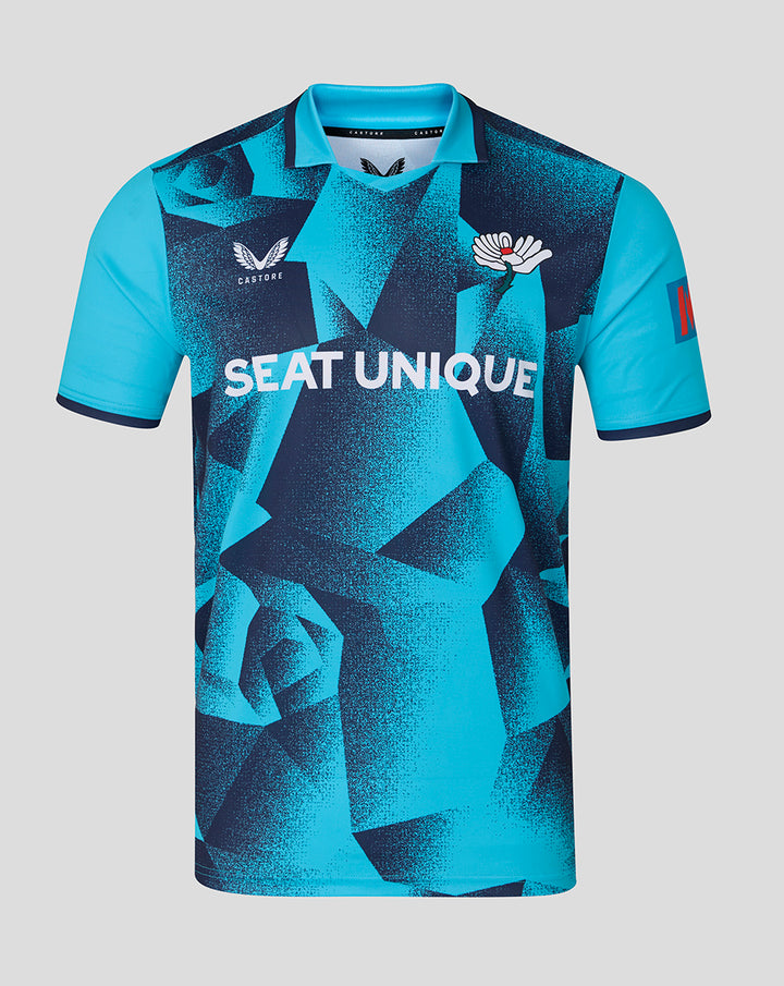 Front view of a blue geometric ODI short sleeve jersey with Seat Unique across the chest.