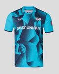 Front view of a blue geometric ODI short sleeve jersey with Seat Unique across the chest.