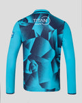 Back view of turquoise Mens 26/27 OD Long Sleeve Jersey Aqiarius with blue geometric pattern and Titan Wealth logo.