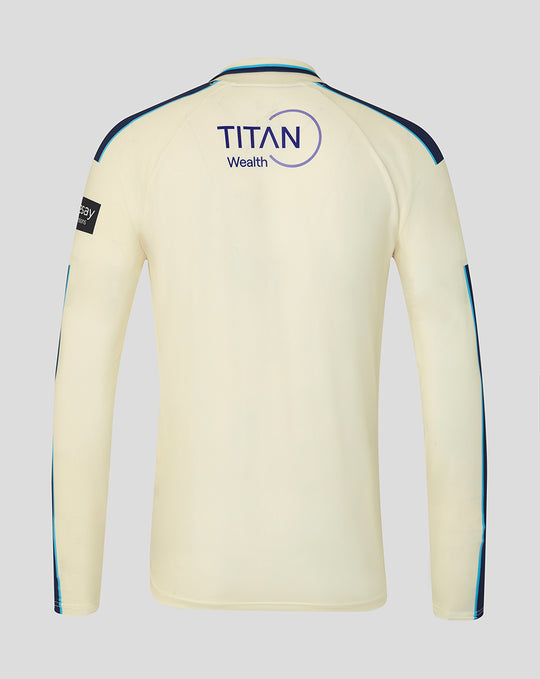 Back view of cream long sleeve cricket jersey with Titan Wealth logo and blue shoulder piping.