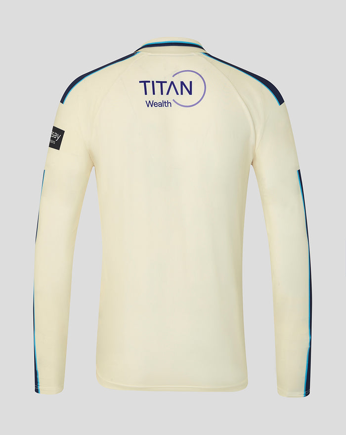 Back view of cream long sleeve cricket jersey with Titan Wealth logo and blue shoulder piping.