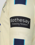 Cream long sleeve cricket jersey with Rothesay sponsor patch and blue block details