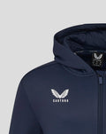 Close-up of navy Yorkshire Zip Through Brushback Hoody with Castore wing logo on chest and hood interior tag